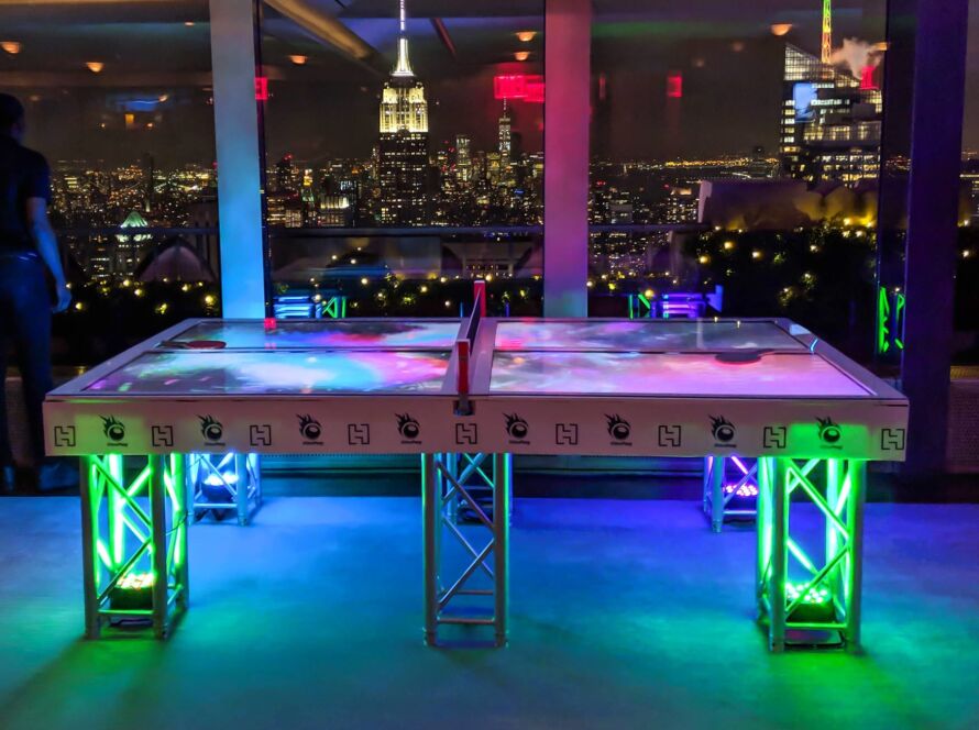 Video Ping Pong Ping Pong Unlike Any Other Hi hi-tech, high energy video ping pong is a regulation-size ping pong made up of multiple HD TVs connected into video wall configuration, looping fun and amazing videos to add to the party ambiance!